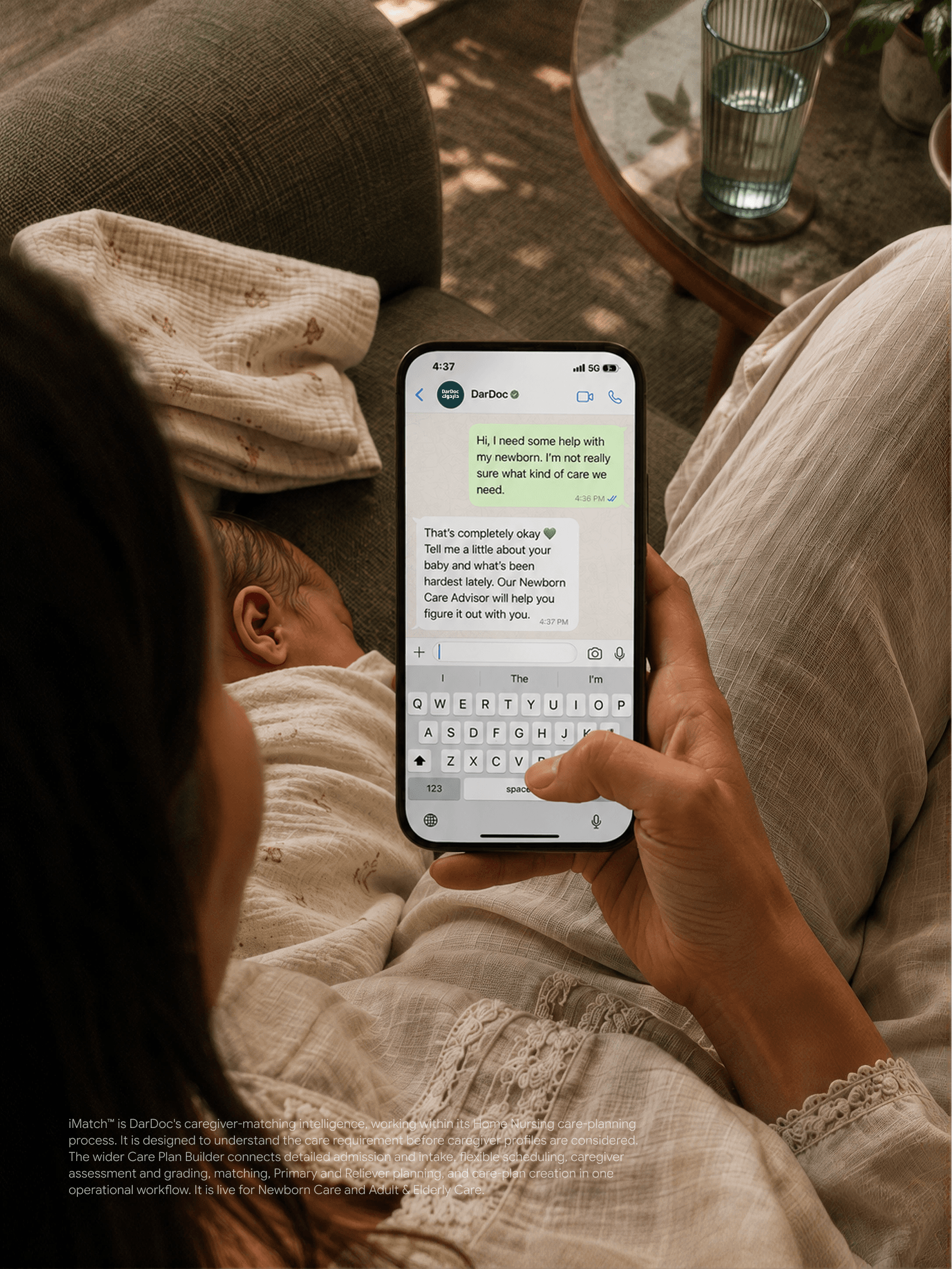Mother viewing a DarDoc newborn care conversation on a smartphone